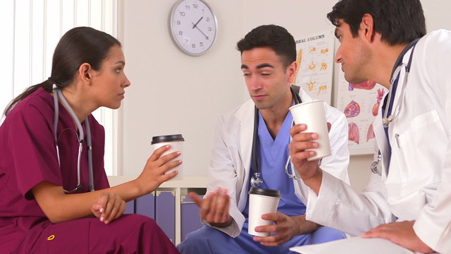 Mexican doctors talking on their coffee break