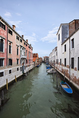Obraz na płótnie Canvas Buildings along a canal, Venice, Veneto, Italy