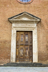 Closed door of a building, Siena, Siena Province, Tuscany, Italy