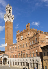 Obraz premium Low angle view of a tower, Torre Del Mangia, Palazzo Pubblico, Piazza Del Campo, Siena, Siena Province, Tuscany, Italy