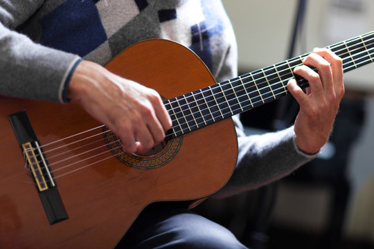 Man playing the guitar