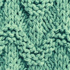 Vintage green  knitting background texture. Knit woolen Fabric t