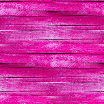 seamless texture of the wooden fence of the old pink