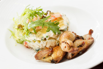 Russian salad with quail