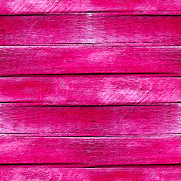 seamless texture of wood planks in pink paint background