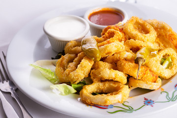 Deep Fried Calamaris Served with Red and White Sauce