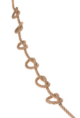 Obraz premium Knots and loops on the decorative rope, close-up.