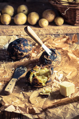 Closeup of jacket potatoes with butter