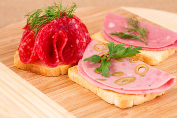 Sandwiches with salami and mortadella