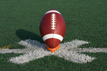 American Football teed up for kickoff