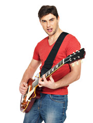 guitarist  man plays on the electric guitar