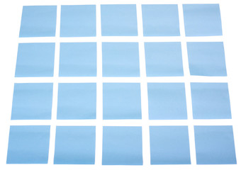 Blank adhesive notes on a white background