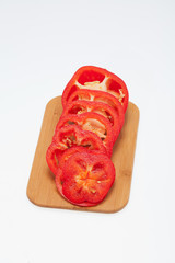 Sliced red pepper isolated on white background