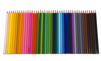 Close-up of colored pencils in a row