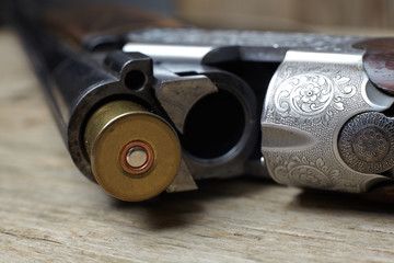 vintage hunting gun with shells