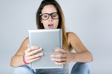 Fototapeta premium Beautiful young woman with digital tablet