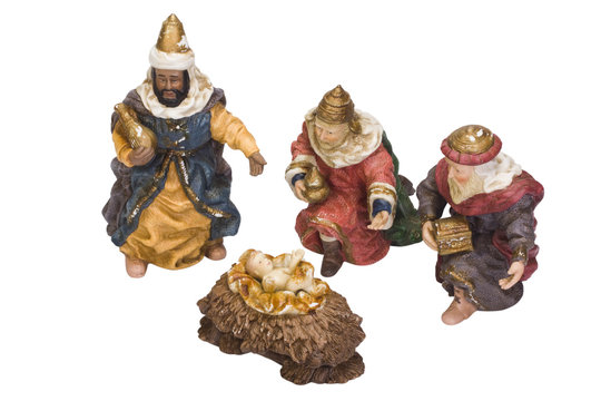 Figurines of kings near baby Jesus