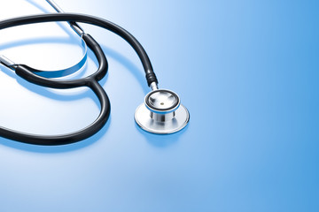 青色の背景に聴診器