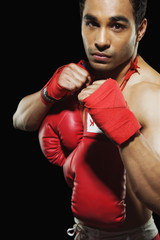 Male boxer in fighting stance