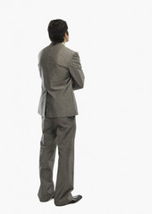 Rear view of a man with arms crossed