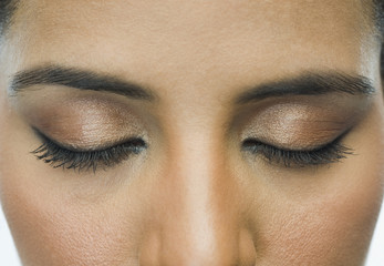 Close-up of a woman with eye make-up