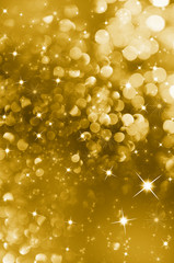 Gold Christmas background with sparkles and stars design