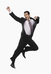 Businessman jumping