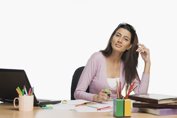 Female fashion designer working in an office