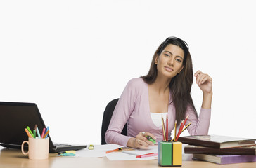 Female fashion designer working in an office