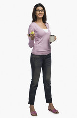 Female fashion designer drinking coffee