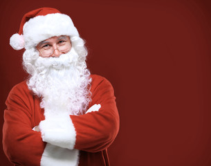 Fototapeta na wymiar Photo of happy Santa Claus in eyeglasses looking at camera