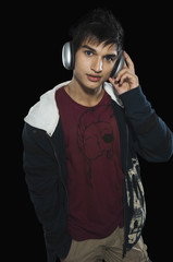 Portrait of a man listening to headphones