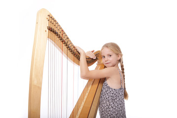 young girl in dress and her harp