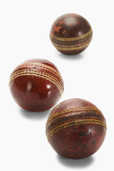 Obraz premium Close-up of old and new cricket balls