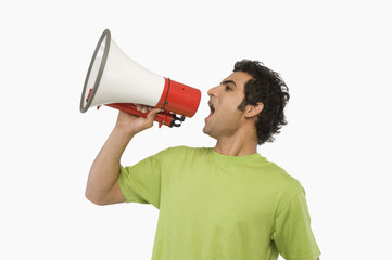 Man shouting into a megaphone