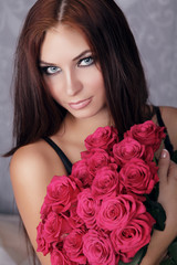 Young attractive girl With Flower Bouquet. Valentines day