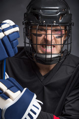 Obraz premium Close up of Angry face of hockey player.