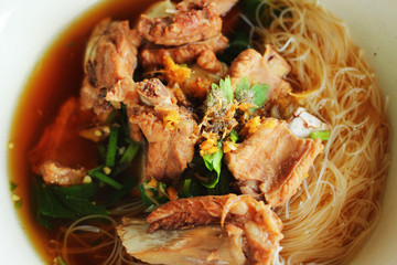 Pork noodles in soup asian style