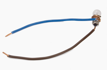Close-up of wires connected to a light bulb