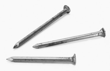 Close-up of three nails