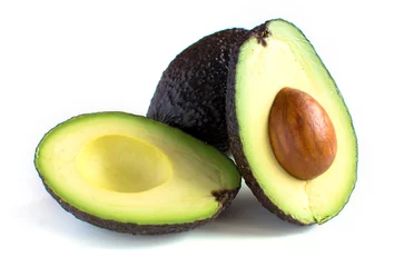 Foto op Plexiglas A fresh avocado cut in half © grounder