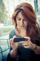 beautiful red head woman on the phone