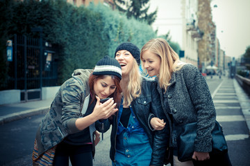 three friends woman on the phone