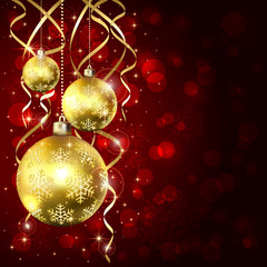 Three golden Christmas balls