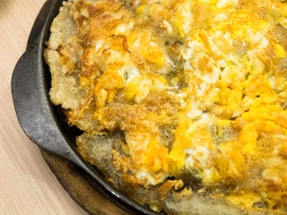 Oyster omelet fire with egg in hot plate