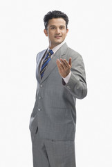 Portrait of a businessman gesturing