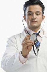 Doctor examining with a stethoscope