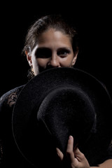 Fototapeta na wymiar Woman with black hat