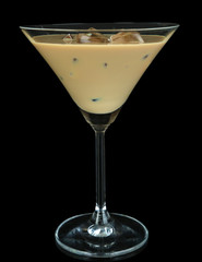 Baileys liqueur in glass isolated on black