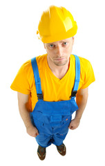 Portrait of young builder isolated on white